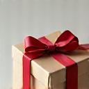 Close-up of a customized handmade gift box tied with ribbon